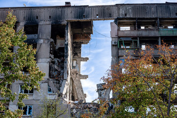 destroyed and burned houses in the city during the war in Ukraine