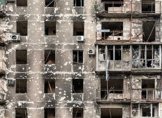 destroyed and burned houses in the city during the war in Ukraine