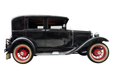 Side view of an early twentieth century black luxury classic car