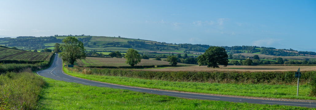 Panoramic view across English farmland on sunny autumn day,