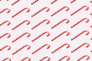 Candy cane flat lay on white background. Christmas theme background