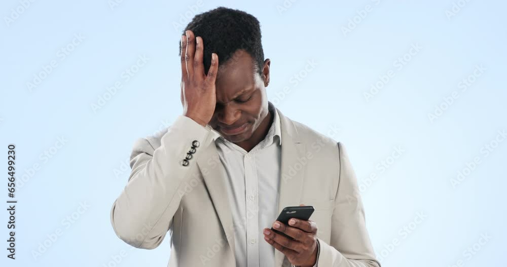 Poster stress, phone and black man in studio networking on social media, mobile app or the internet. frustr