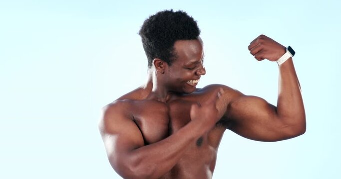 Muscle, flex and face of black man in studio for fitness, bodybuilder training and exercise for strength. Sports, gym and portrait of person with strong body, workout and excited on blue background