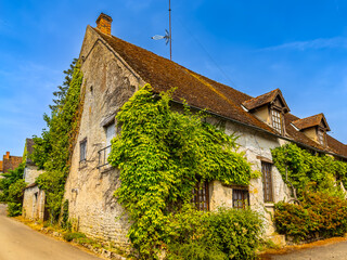 Fototapeta na wymiar Street view of old village Yevre-la-Ville in France