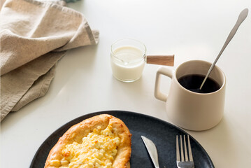 traditional Georgian cuisine.  Open pie with mozzarella cheese. Ajara khachapuri