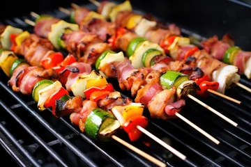Tuinposter close-up of skewers with brussels sprouts and bacon before grilling © Alfazet Chronicles
