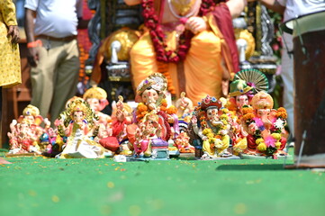 Collection of small statues of the lord Ganesha in the street. God with Elephant face. Big Statue. Main hindu God. Indian God. Street Market of Statues