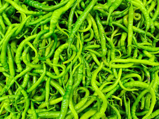 green peppers on the market stall