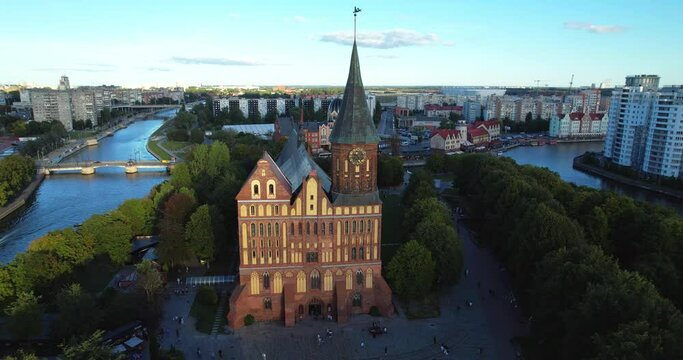 Kaliningrad city aerial view. Immanuel Kant Cathedral and Museum, aerial view. Immanuel Kant Island. Konigsberg at sunset. Pregolya River.