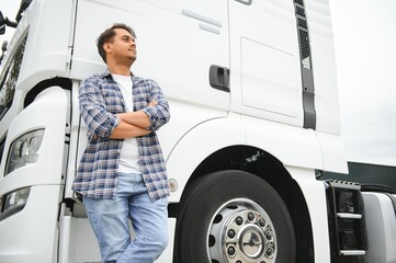 Young Indian truck driver. Concept of road freight transportation