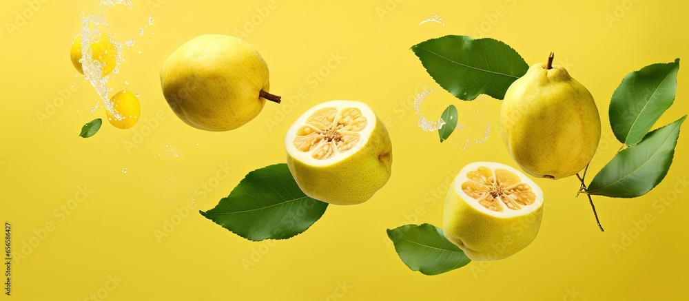 Poster ripe guava in the air with falling leaves on yellow background zero gravity concept high quality ima