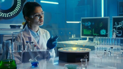 Medium-sized photo capturing an asian female scientist wearing glasses and lab coats sitting in a...