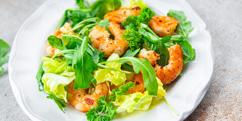fresh shrimp salad prawn seafood shrimps, arugula appetizer meal food snack on the table copy space food background rustic top view 