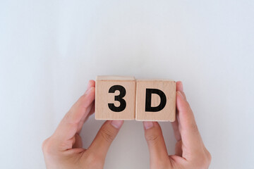 Man hands holding wooden cubes with 3D text on it, three dimensional or design idea, wooden block...