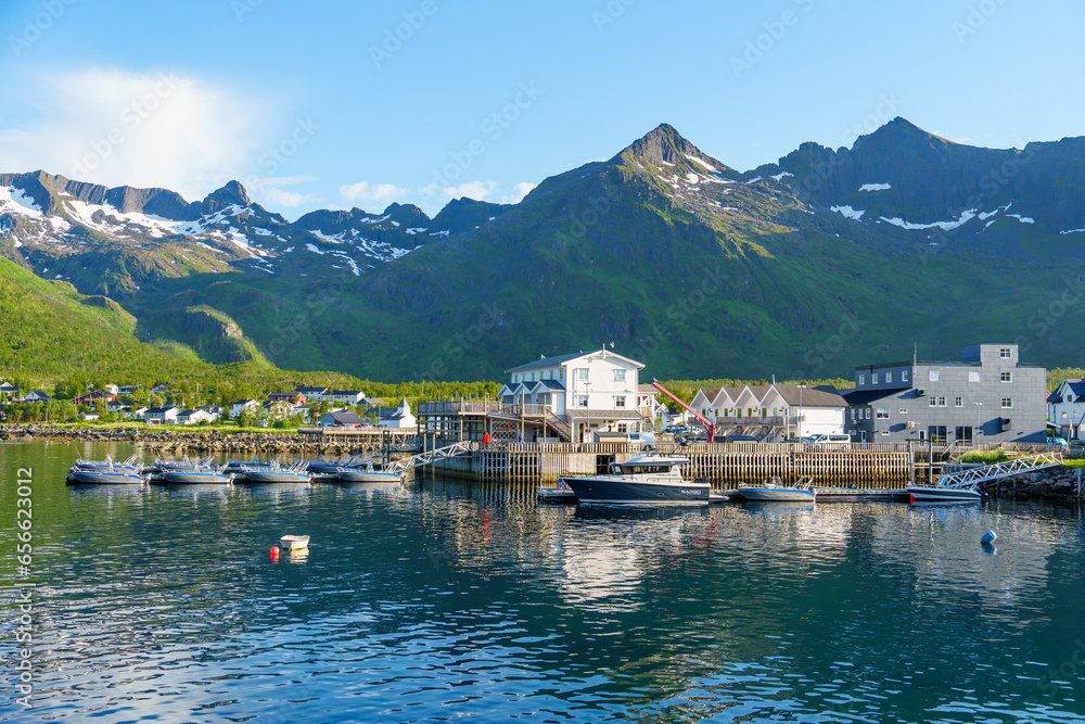 Wall mural fishing base in village mefjordvaer, island senja, norway, mefjord brygge. fishing village in summer