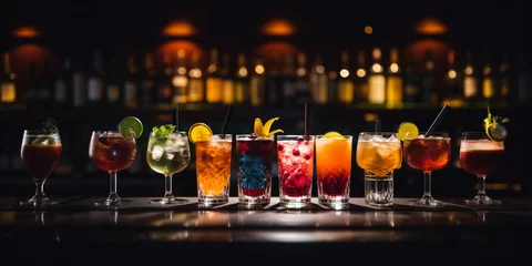  Variety of alcoholic drinks and multi colored cocktails on the reflective surface of bar counter. Blurred shelves with bottles on background. AI generative. © serperm73