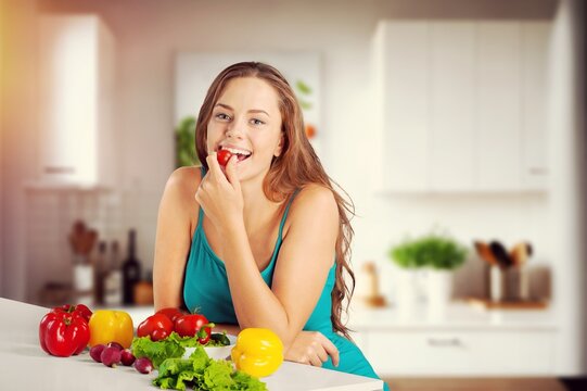 Young woman eating organic vegetable salad, AI generated image