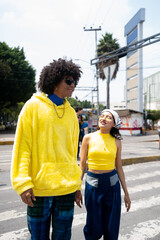 afro mexican man and a young woman going to the bus station at Mexico City