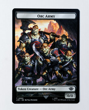 Hamburg, Germany - 06092023: photo of the English magic the gathering trading game card Orc Army Token from the Lord of the Rings Tales of Middle earth set.