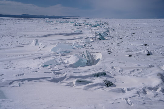 On the ice of Lake Baikal. beautiful pieces of ice. Ice hummock on the ice of lake Baikal