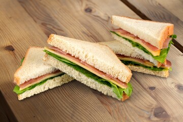 Tasty fresh sandwich with ham and cheese