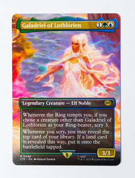 Hamburg, Germany - 06092023: photo of the English magic the gathering card Galadriel of Lothlórien from the Lord of the Rings Tales of Middle earth set on white paper background.