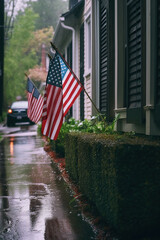 Naklejka premium American flag in the rain. Memorial day, independence day