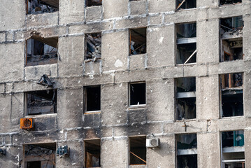 destroyed and burned houses in the city during the war in Ukraine