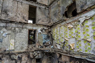 destroyed and burned houses in the city during the war in Ukraine
