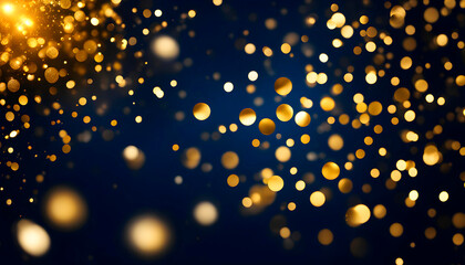 Fototapeta na wymiar Golden shiny particles on a dark blue background for the design of New Year and Christmas greetings.