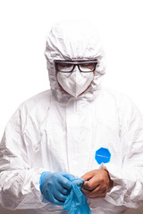 Doctor scientist in white coverall suit, mask and glasses wears blue surgical medical protective gloves.