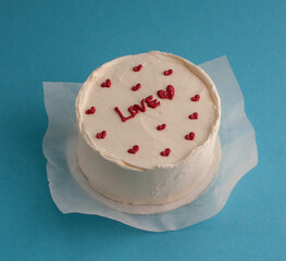 vanilla cakes with name inscriptions on different backgrounds