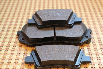 New brake pads for a passenger car. Front and rear brake pads.