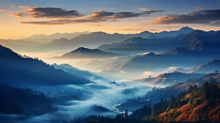 Poster Fog rolling over a mountain range at dawn. © Creative artist1