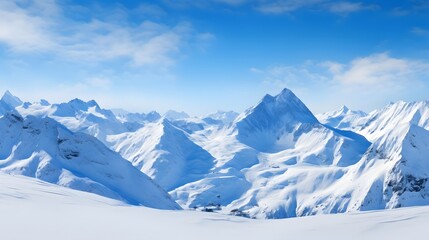 Panoramic view of snow-capped mountain peaks in winter