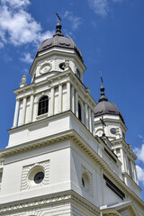 View of old Orthodox white church with grey domes in monastery against background cloudy sky. Concept of Religion, Christianity. Copy space