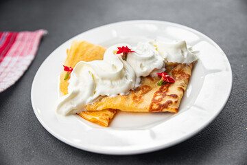 fresh crepes whipped cream tasty pancakes portion sweet dessert appetizer meal food snack on the table copy space food background rustic top view