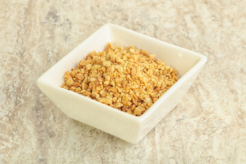 Crunched roasted peanut in the bowl