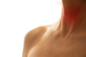 Female throat with a red spot in the middle of the neck on a light background, sore throat, sore throat, flu