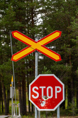 Stop road sign shot broken with a shotgun