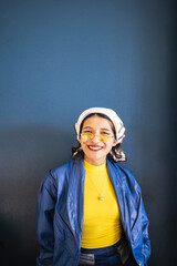Portrait of a smiling and colorful young woman