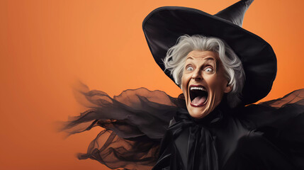 old Halloween witch on an orange background