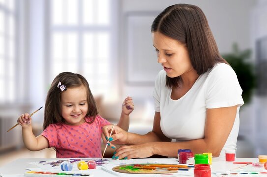preschooler child and young mother study together, AI generated image