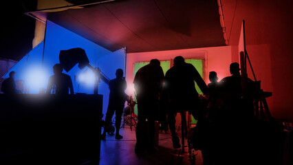 Silhouette images of making of or behind the scenes of video production which produced in the film...