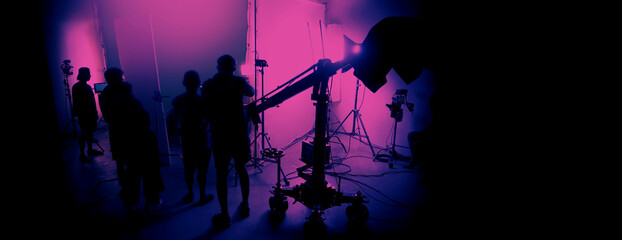 Silhouette images of making of or behind the scenes of video production which produced in the film...