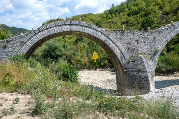 Fototapeta na wymiar Medieval Plakidas Bridge at Pindus Mountains, Greece