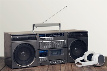 Obraz premium Retro radio or old cassette recorder on desk