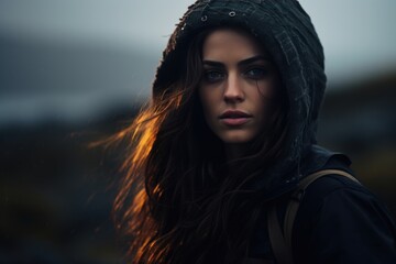 Young woman traveler against the backdrop of nature
