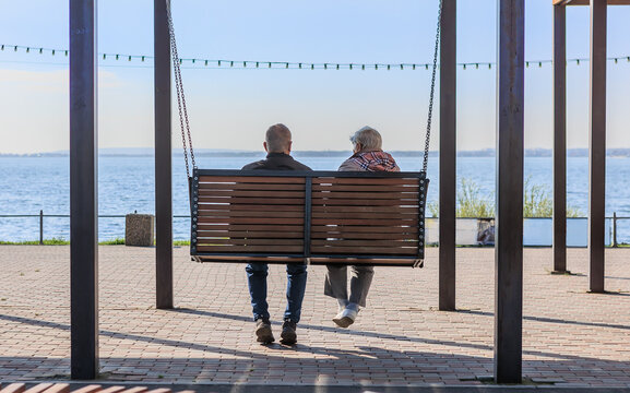 Couple of pensioners resting on a bench