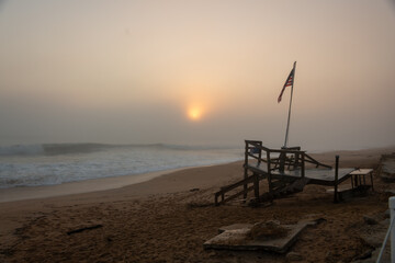 Sunrise on foggy Florida beach